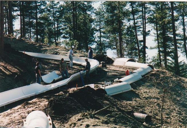 Contractors on the hill assembling the Alpine Slide back in 2003
